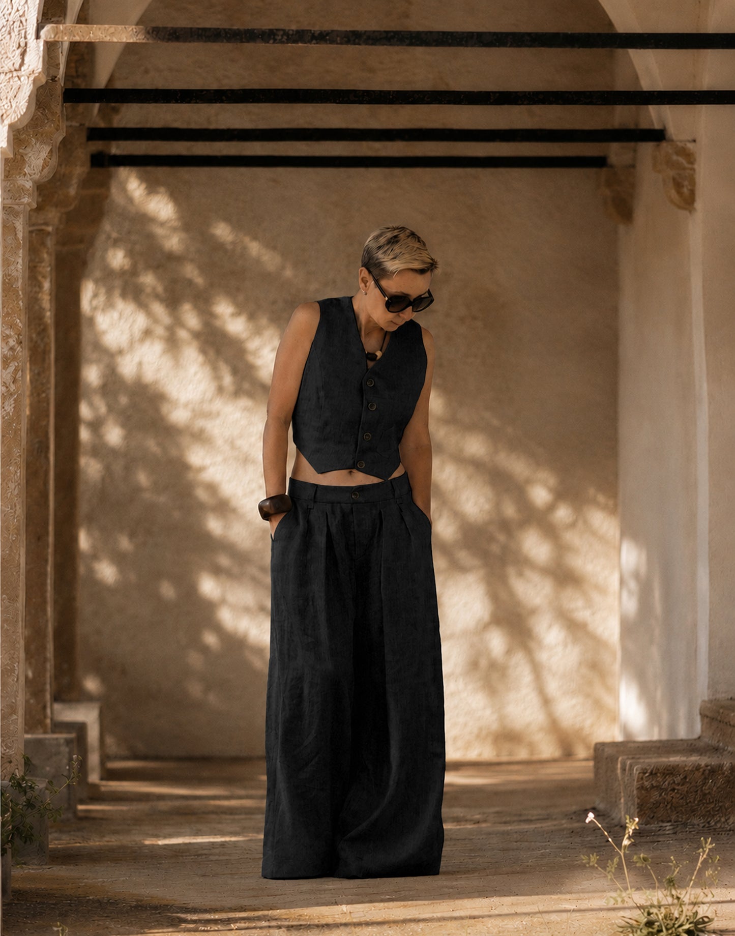 Handmade Black Olive linen vest designed for layering and everyday wear