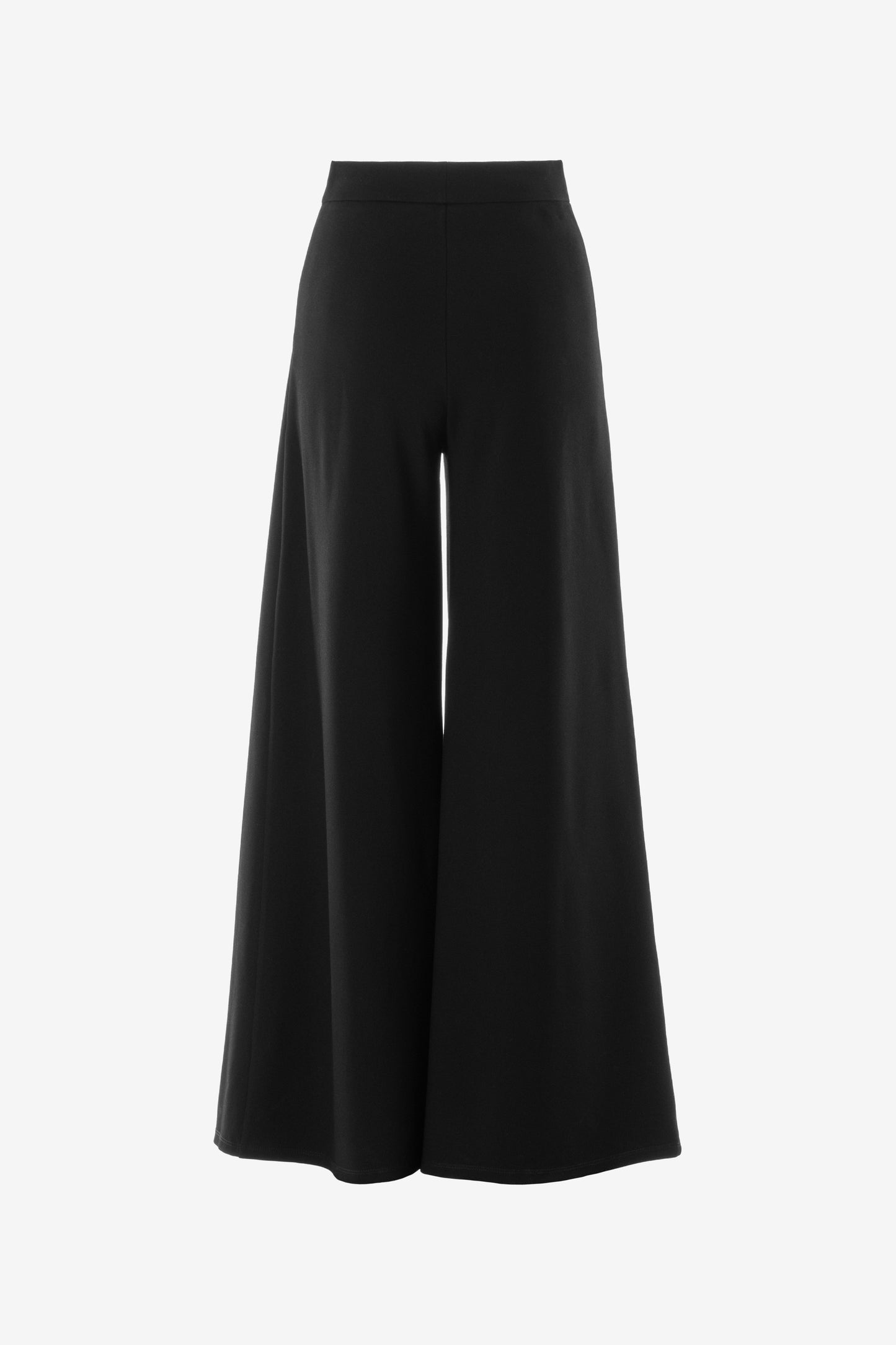 Rear view of the flared pants highlighting wide-leg design