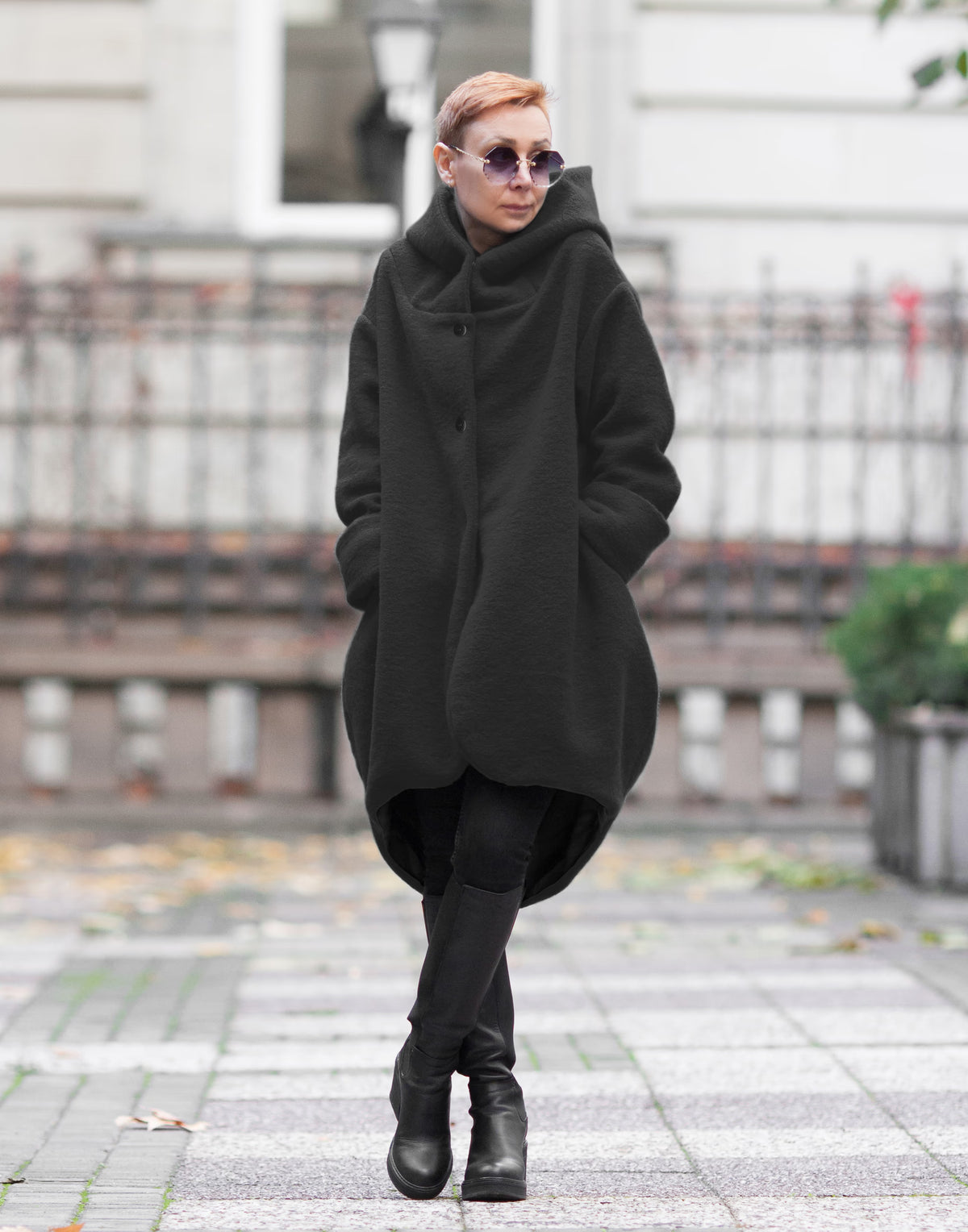 Black oversized hooded coat in 100% wool worn on female model